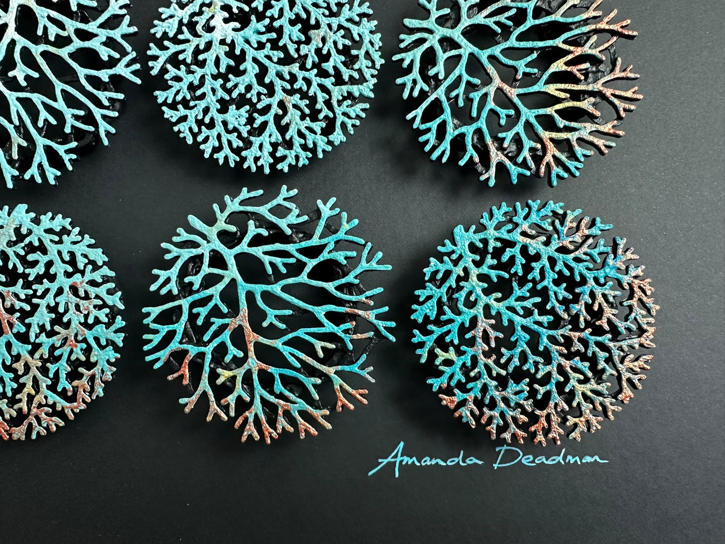 CORALLIUM - SOFT VERDIGRIS ON BLACK